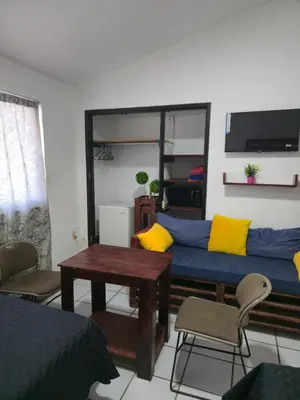 Zona de estar de Cómoda habitación doble #5
