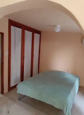 Cama o camas de una habitación en Cozy little beach house