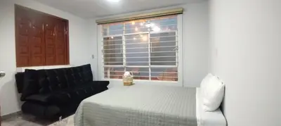 Cama o camas de una habitación en Casa de huéspedes Chukum