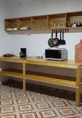 Una cocina o zona de cocina en Casa de huéspedes Chukum
