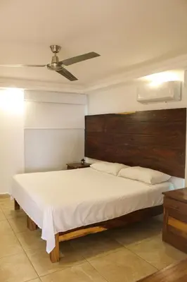 Cama o camas de una habitación en Penthouse vistamar puerto escondido