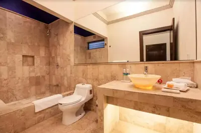 Un baño de Orchidelirium Casa Hotel & Salud Estética