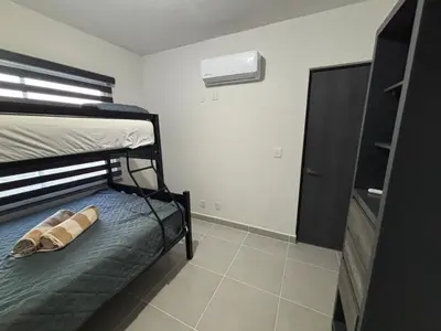 Cama o camas de una habitación en Departamento Acapulco Barra Vieja & Club de Playa