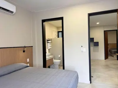 Cama o camas de una habitación en Rooms Sector M