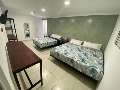 Cama o camas de una habitación en Hotel Sicarú