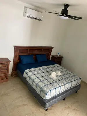 Cama o camas de una habitación en Casa la esperanza AB