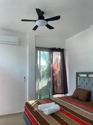 Cama o camas de una habitación en Casa la esperanza AB
