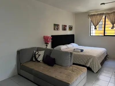 Cama o camas de una habitación en Descanso ideal, Sobre carretera a Puerto, Muy cerca del aeropuerto