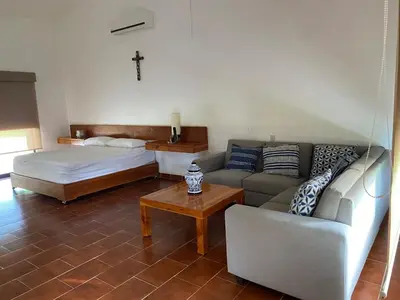 Cama o camas de una habitación en Vacation House Chamilpa