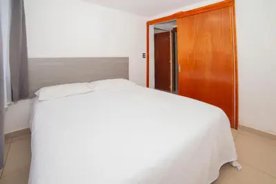 Cama o camas de una habitación en condominio los mangos