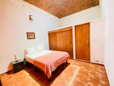 Cama o camas de una habitación en Hotel Tepetzalan