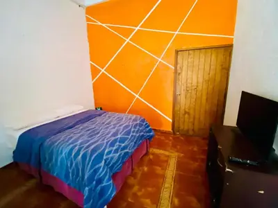 Cama o camas de una habitación en Hotel Tepetzalan