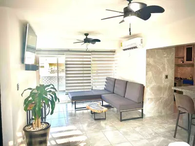Zona de estar de Playa Diamante 25 Amazing Family Apartment!