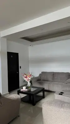 Zona de estar de Habitación en departamento de lujo