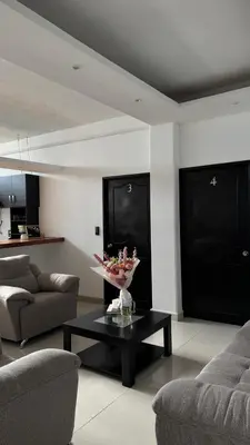Zona de estar de Habitación en departamento de lujo