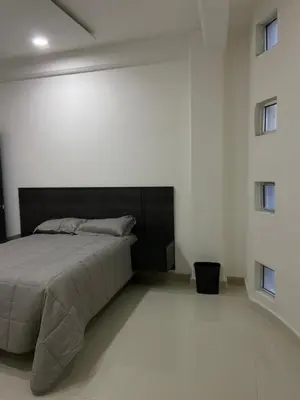 Cama o camas de una habitación en Habitación en departamento de lujo