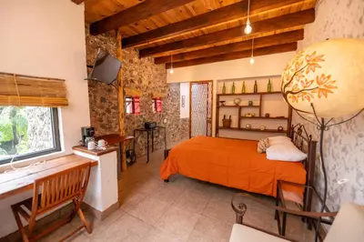Cama o camas de una habitación en Tecuán-Calli