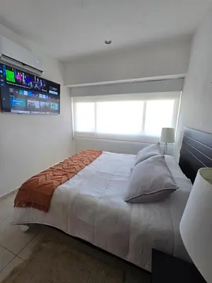 Cama o camas de una habitación en Descanso en ACAPULCO DIAMANTE
