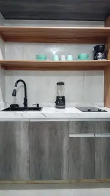 Una cocina o zona de cocina en Departamento, Refugio Diamante & Pool
