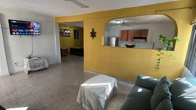Una televisión o centro de entretenimiento en Casa Aca