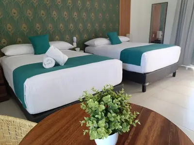 Cama o camas de una habitación en Punta Colibrí
