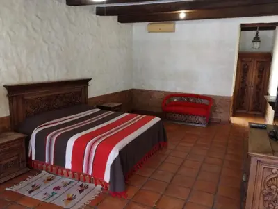 Cama o camas de una habitación en Villas Don Zeferino