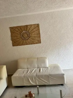 Zona de estar de Depto en Planta Baja con Alberca, WiFi Rápido y Smart TV