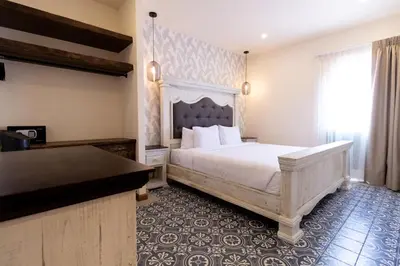 Cama o camas de una habitación en Bendito Capricho Hotel