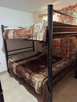 Cama o camas de una habitación en Neza Esperanza