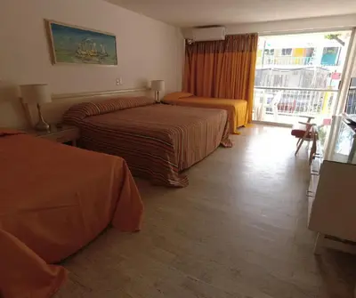 Cama o camas de una habitación en hotel sands