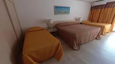 Cama o camas de una habitación en hotel sands