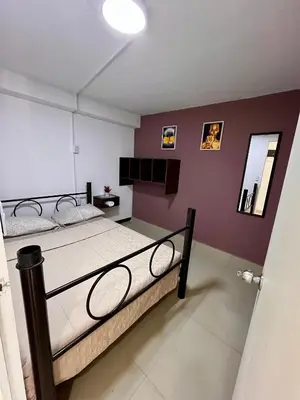 Cama o camas de una habitación en Hospedaje Casa Azul