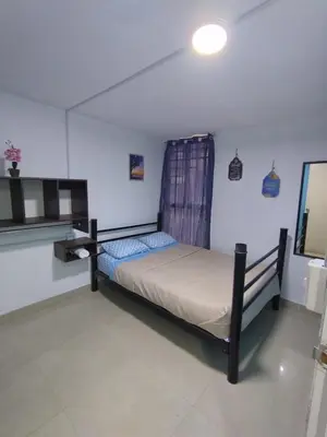 Cama o camas de una habitación en Hospedaje Casa Azul