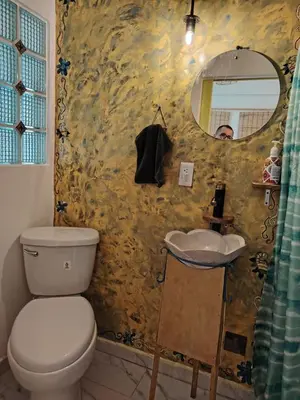 Un baño de Ganesha HOSTAL