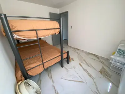Cama o camas de una habitación en Casa entera gran ubicación, aeropuerto ver