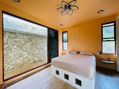 Cama o camas de una habitación en Villas Lidxy Belegui