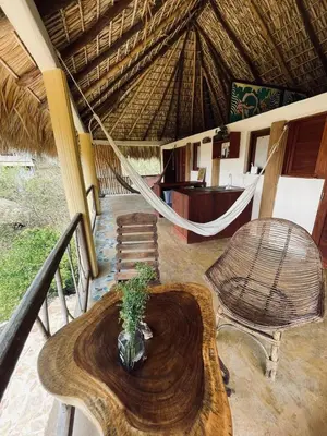 Zona de estar de Columpio del Reptil cabaña