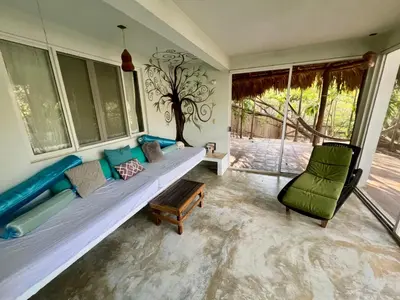 Zona de estar de Casa Pauline Beach house habitaciones con acceso directo a playa y alberca