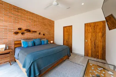 Cama o camas de una habitación en 3060 - Bocana Beach Condo B2