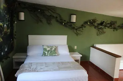 Cama o camas de una habitación en Hotel Mythos