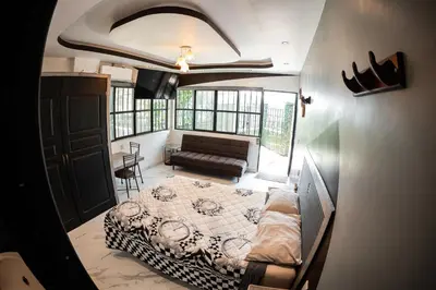 Zona de estar de Habitación Verde Amanecer