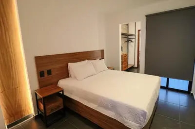 Cama o camas de una habitación en Palmas luxury apartment 102