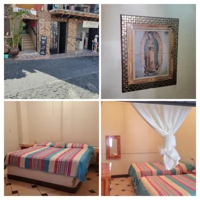 Cama o camas de una habitación en Hotel Suites Taxco
