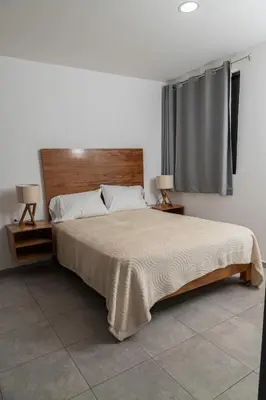 Cama o camas de una habitación en Hotel Entre Volcanes