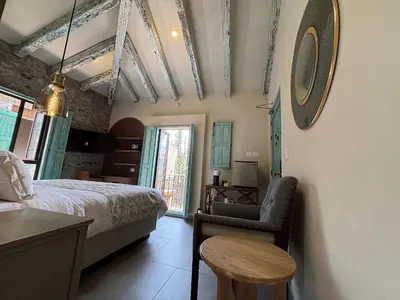 Cama o camas de una habitación en Castello di Carlo - Departamento Carlo Magno III