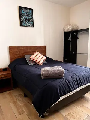 Cama o camas de una habitación en Bonito Departamento cerca de Foro de GNP