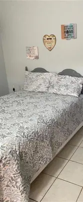 Cama o camas de una habitación en Victoria Habitación Privada