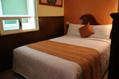 Cama o camas de una habitación en Hotel Boutique AB
