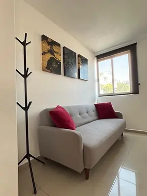 Zona de estar de Cómodo Departamento en San Andrés Cholula