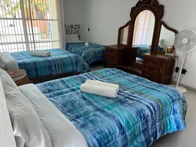 Cama o camas de una habitación en Las Fuentes Casa jardín alberca con caldera opcional